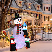 6Ft Lighted Christmas Inflatable Snowman with Three Cute Penguins, Building Color LED Lights Outdoor Indoor Holiday Decorations Blow up Yard Inflatables Home Decor